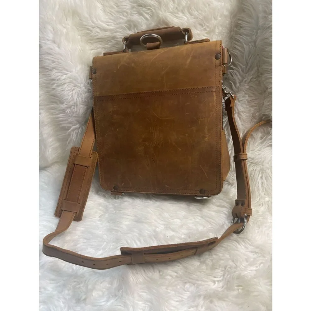 Saddleback Leather Brown convertible Messenger/backpack with. Removable divider